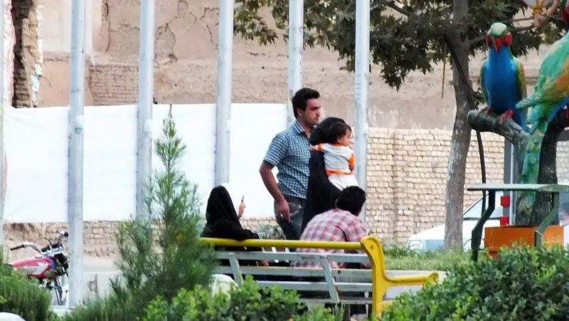 family walking park
