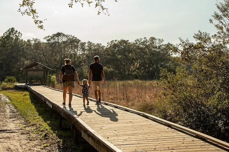 family walking park