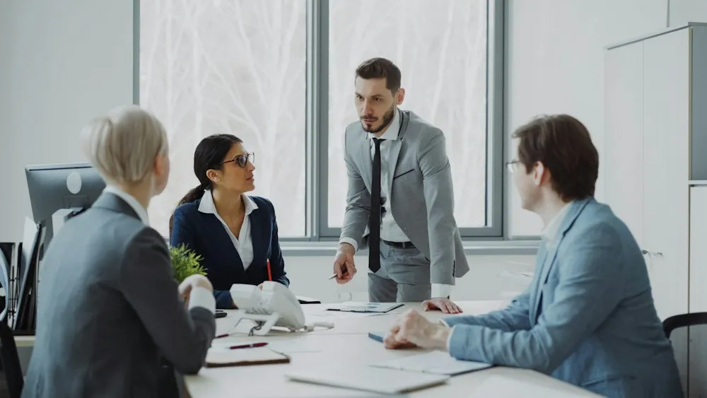 Colleagues discussing documents
