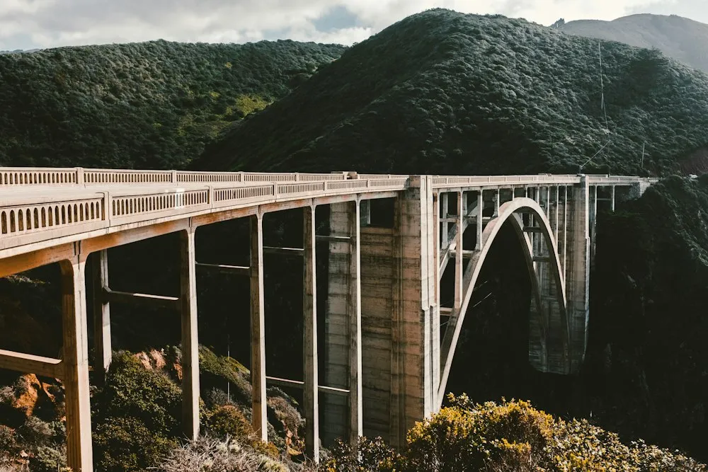 A concrete arch bridge spanning a canyon