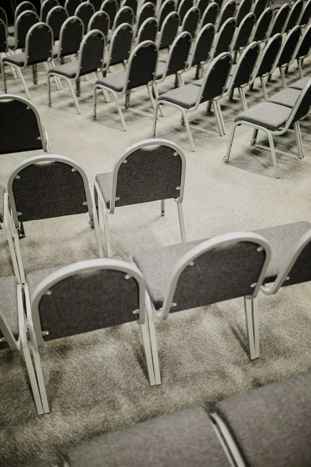 Empty chairs waiting for people at a meeting