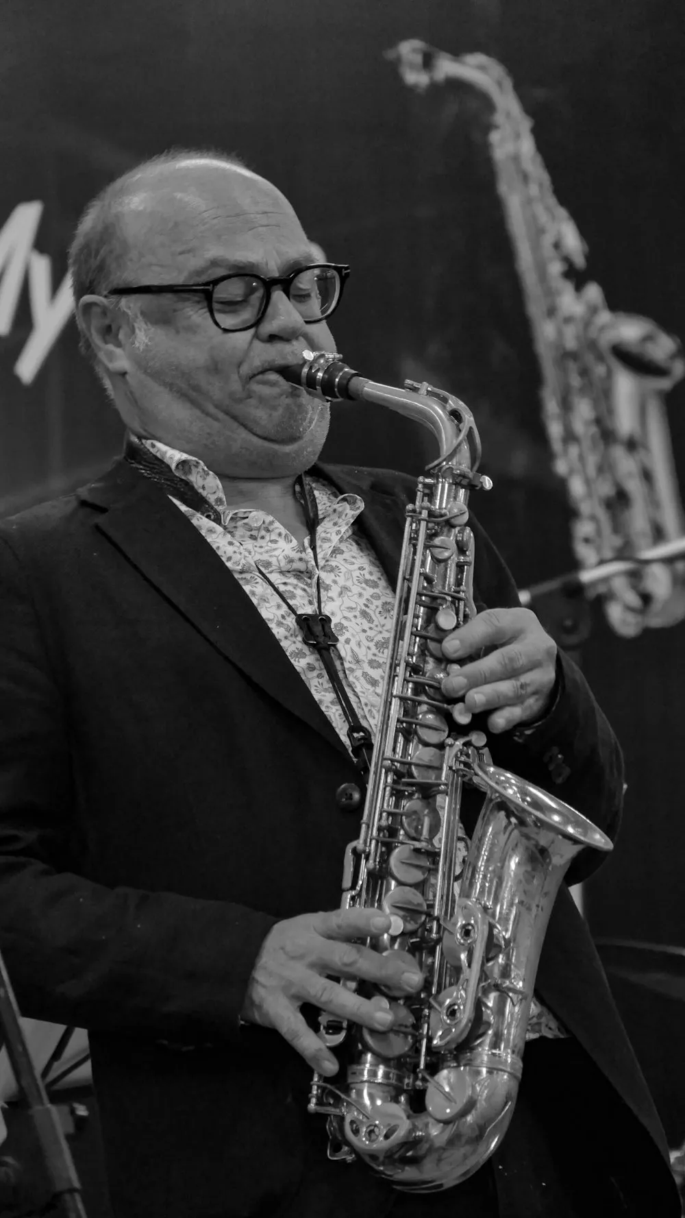 A jazz musician playing a saxophone