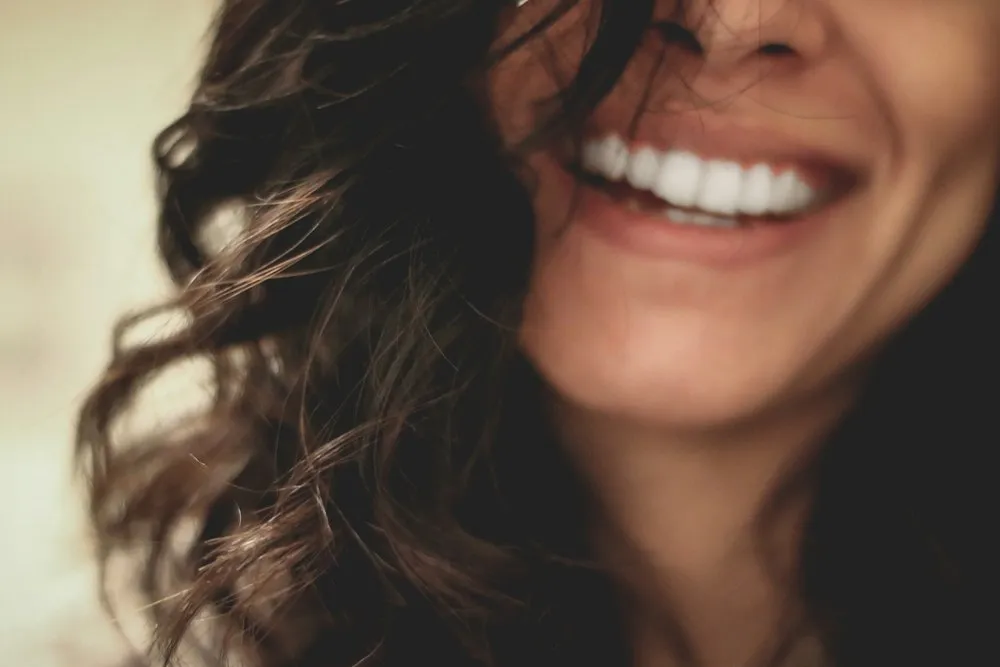 Woman smiling happily