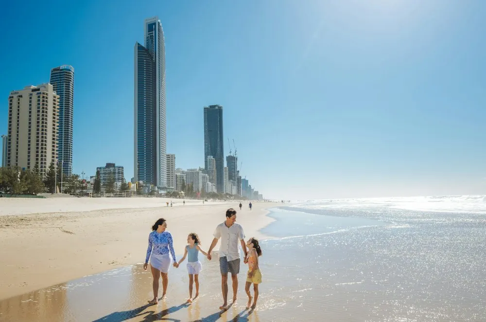 Family walking along the beach